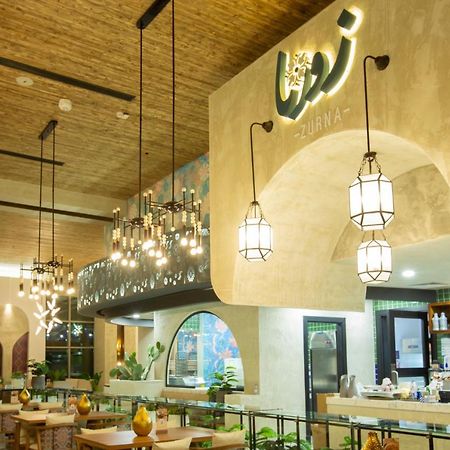 Citadines Abha Aparthotel ภายนอก รูปภาพ Interior of the restaurant