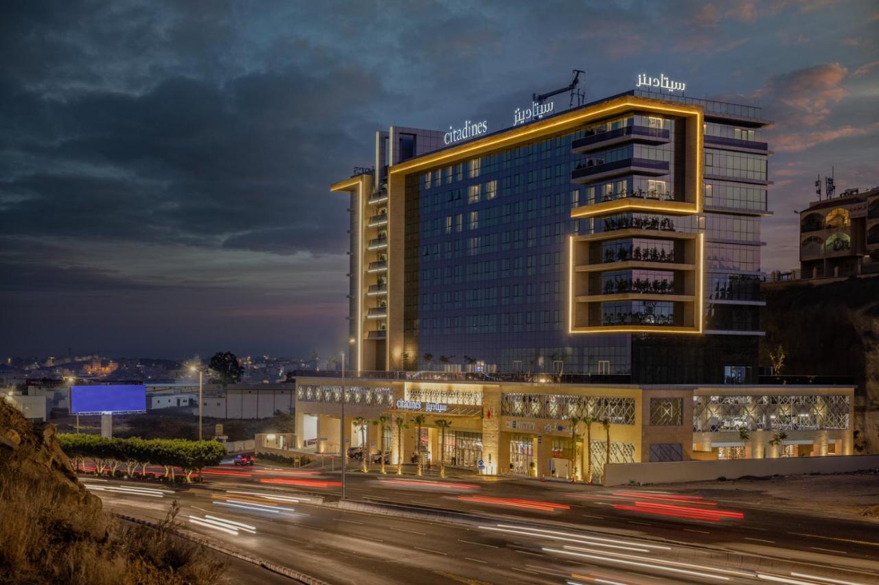 Citadines Abha Aparthotel ภายนอก รูปภาพ The hotel at night