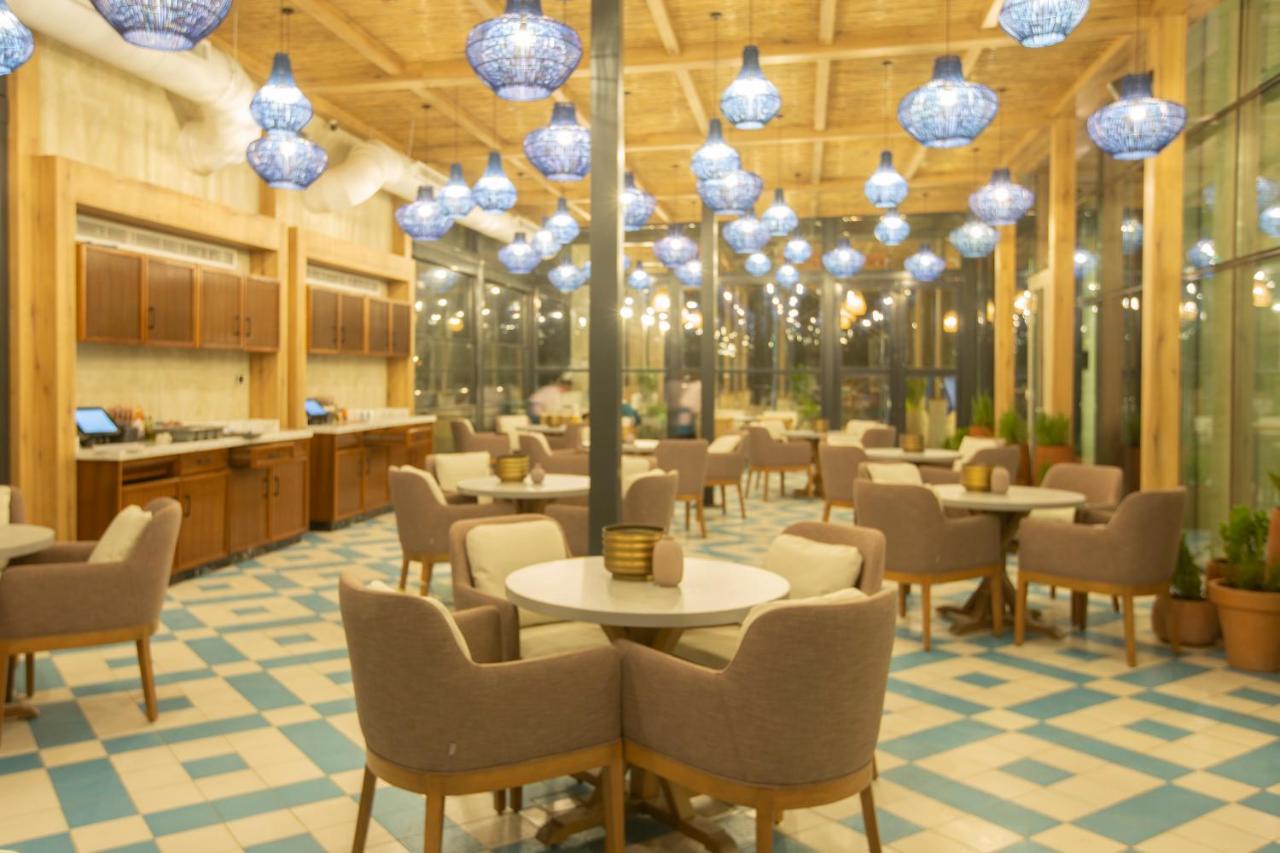 Citadines Abha Aparthotel ภายนอก รูปภาพ The interior of the restaurant